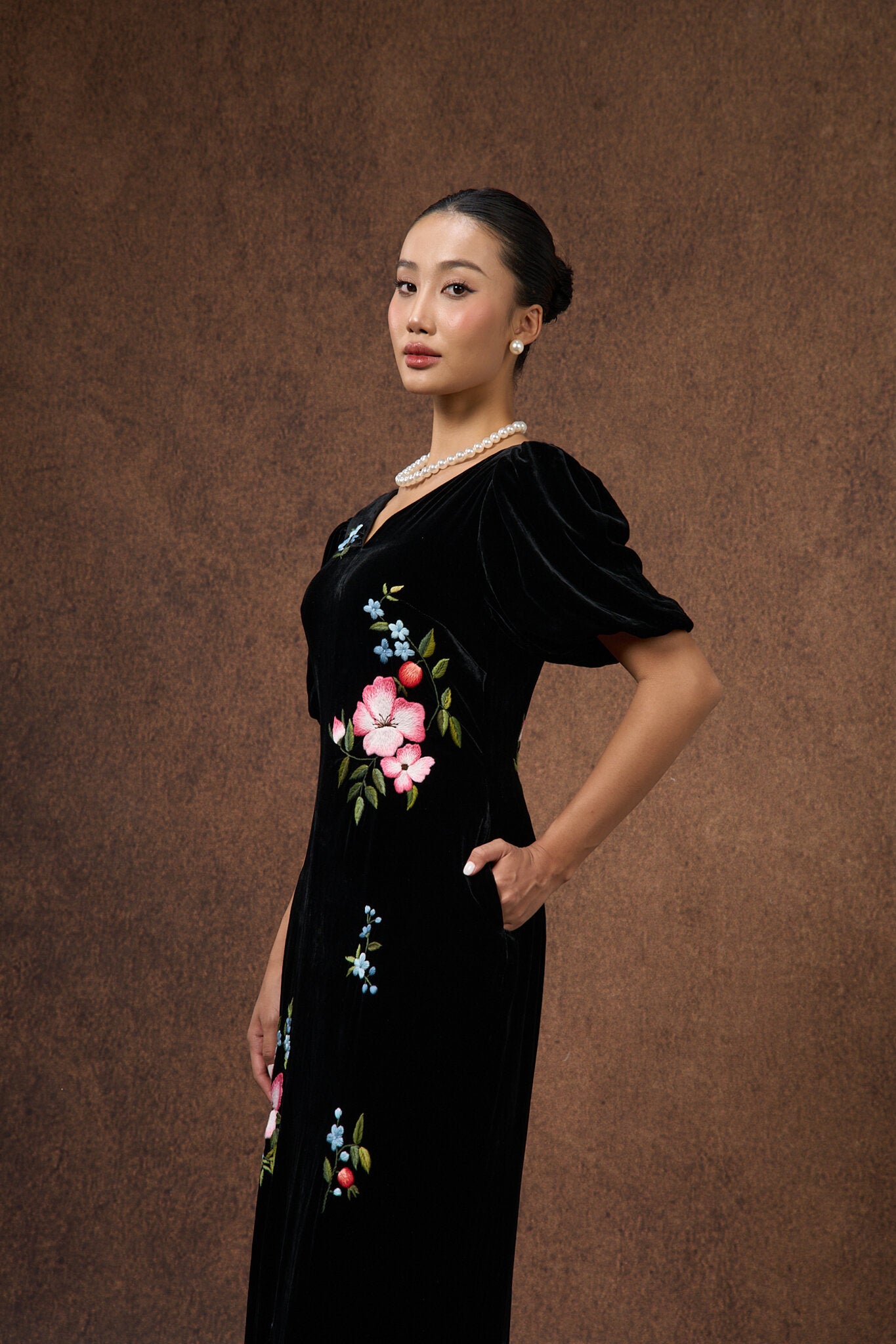 Detail of the puff sleeve on the black floral silk velvet dress