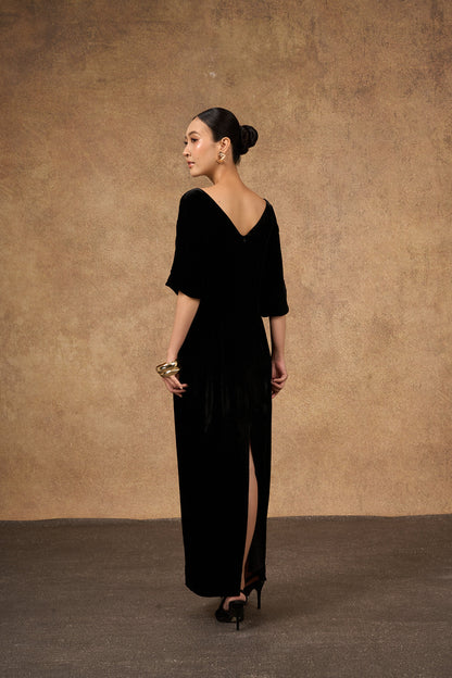 Detail of the bodice of the black and gold hand-embroidered silk velvet dress