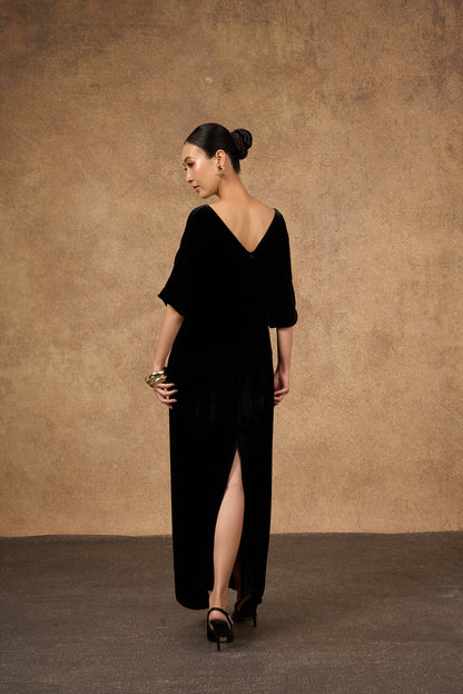 Hand-embroidered black and gold silk velvet dress, three-quarter view