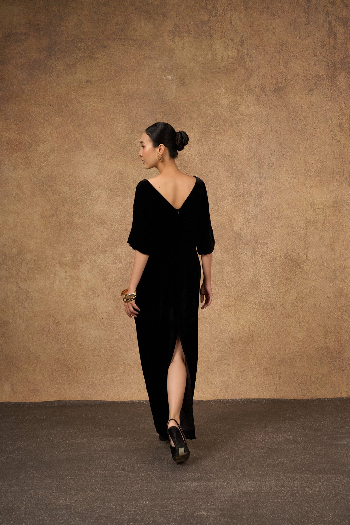 Detail of the kimono sleeve on the black and gold silk velvet dress