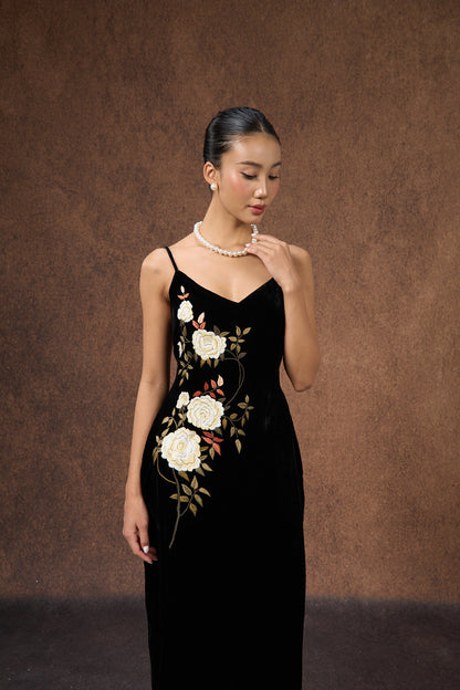 Model wearing the hand-embroidered black rose silk velvet evening dress
