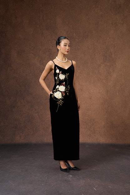 Side view of the hand-embroidered black rose silk velvet evening dress