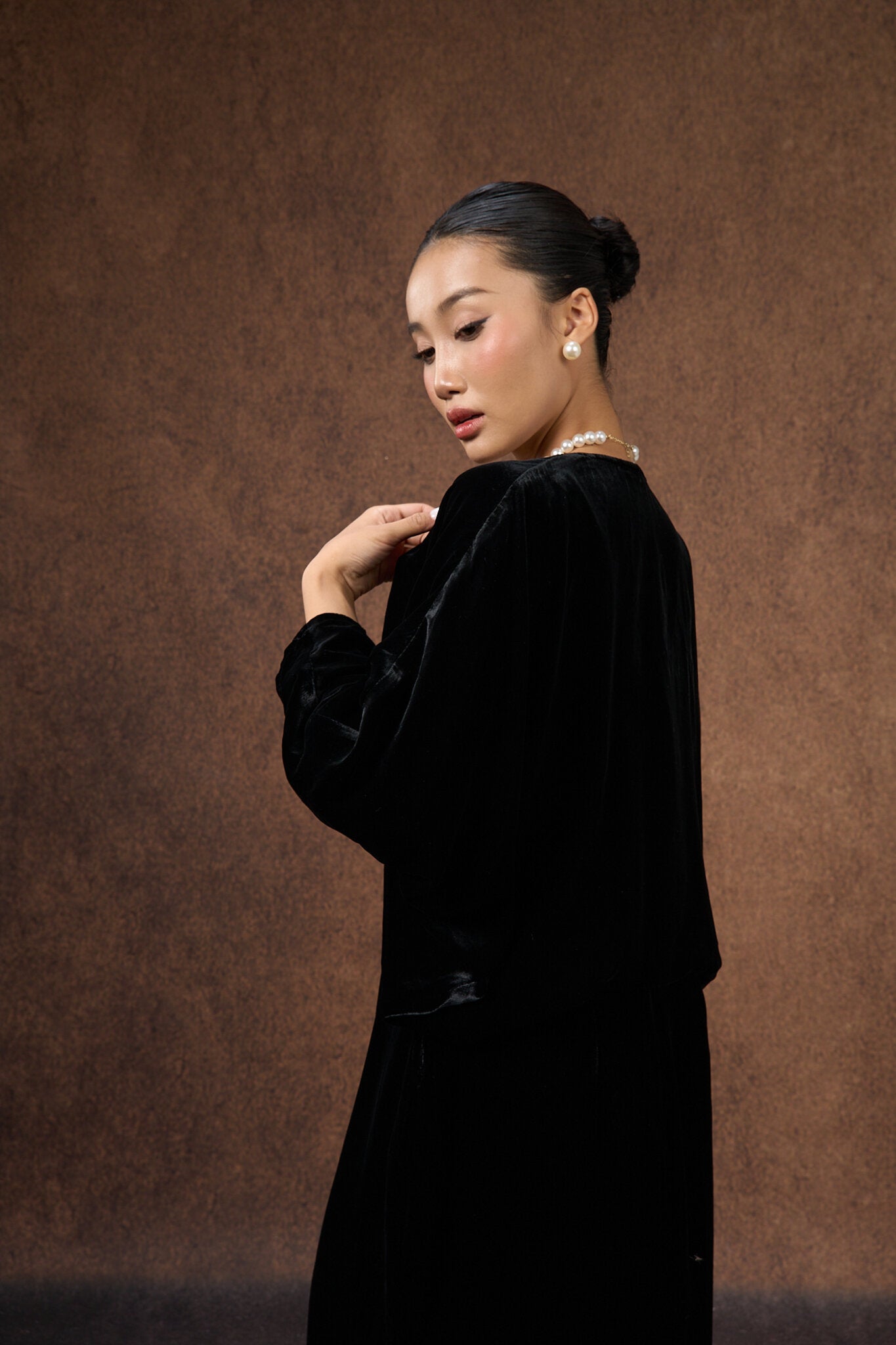 Detail of the batwing sleeve on the black silk velvet bolero wrap