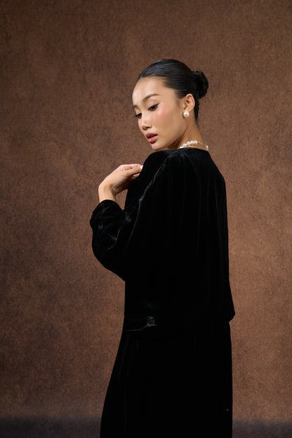 Detail of the batwing sleeve on the black silk velvet bolero wrap
