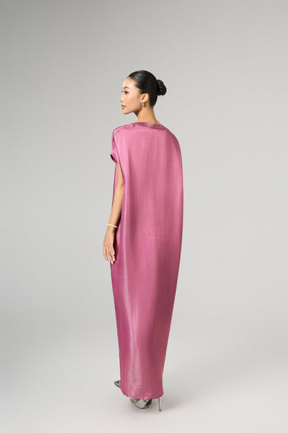 Model wearing the Seraphine dusty rose hand-dyed silk kaftan maxi dress
