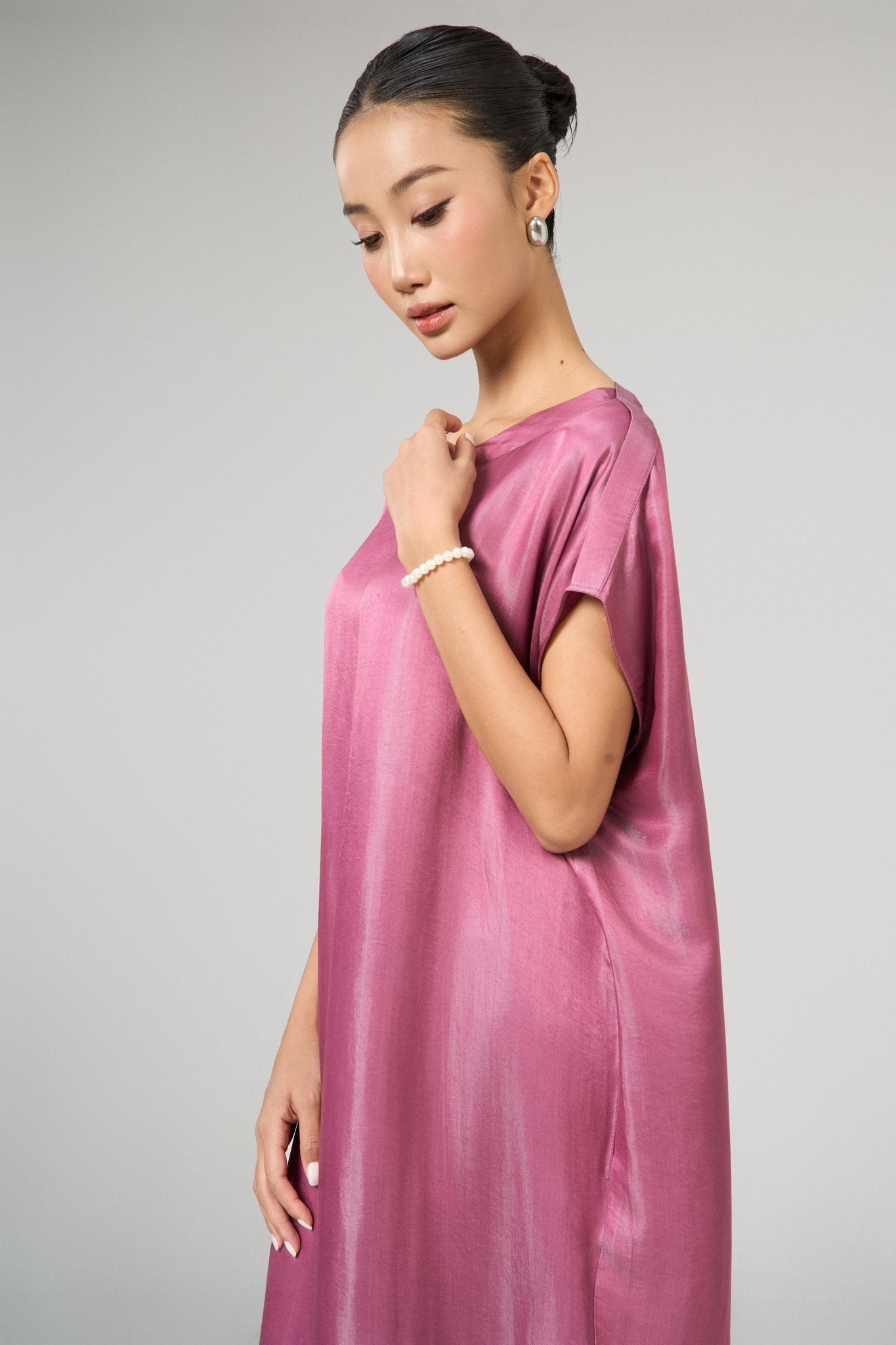 Seraphine dusty rose silk kaftan maxi dress shown from the side