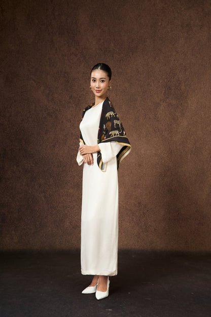 Detail of the Celeste ivory pearl silk maxi dress with flared sleeves