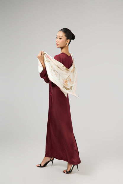 Model wearing the Celeste bordeaux rose silk maxi dress, styled with a floral silk scarf