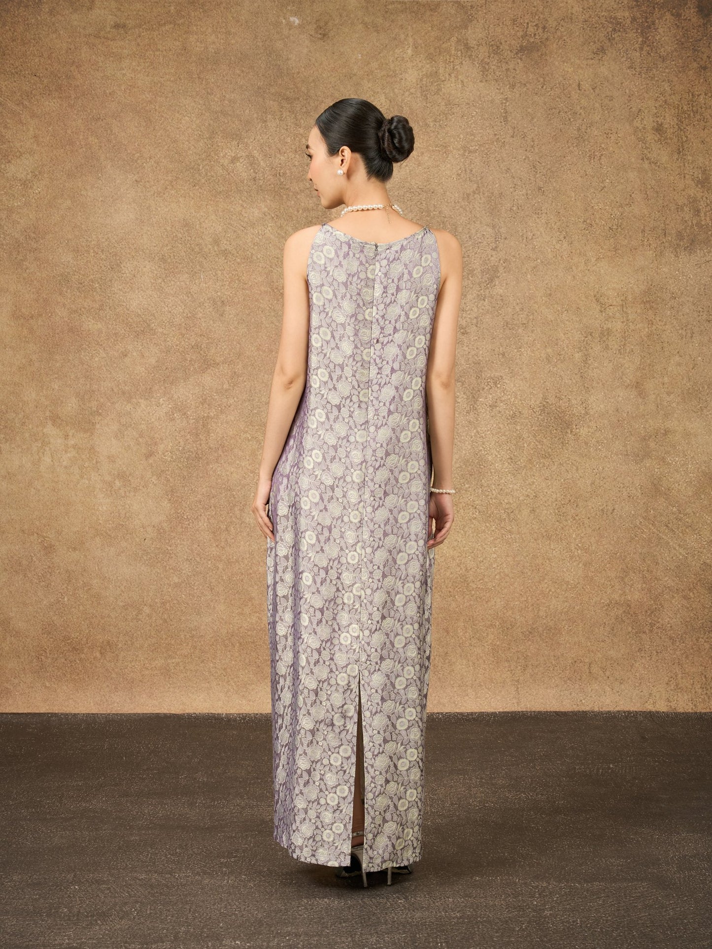 Model wearing the Aurora moonlit lilac silk jacquard maxi dress, side view