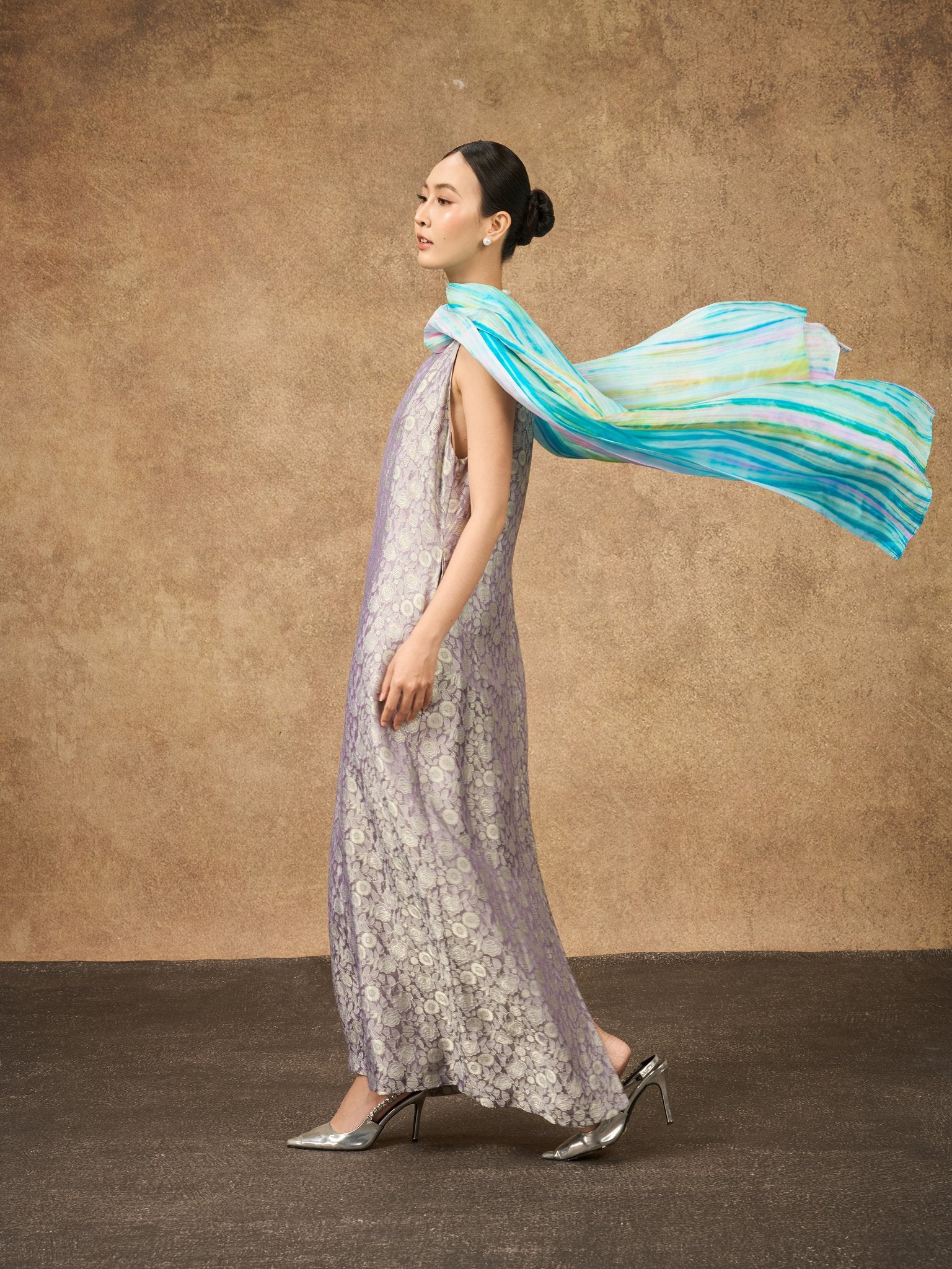 Model wearing the Aurora moonlit lilac silk jacquard maxi dress with a hand-dyed silk shawl
