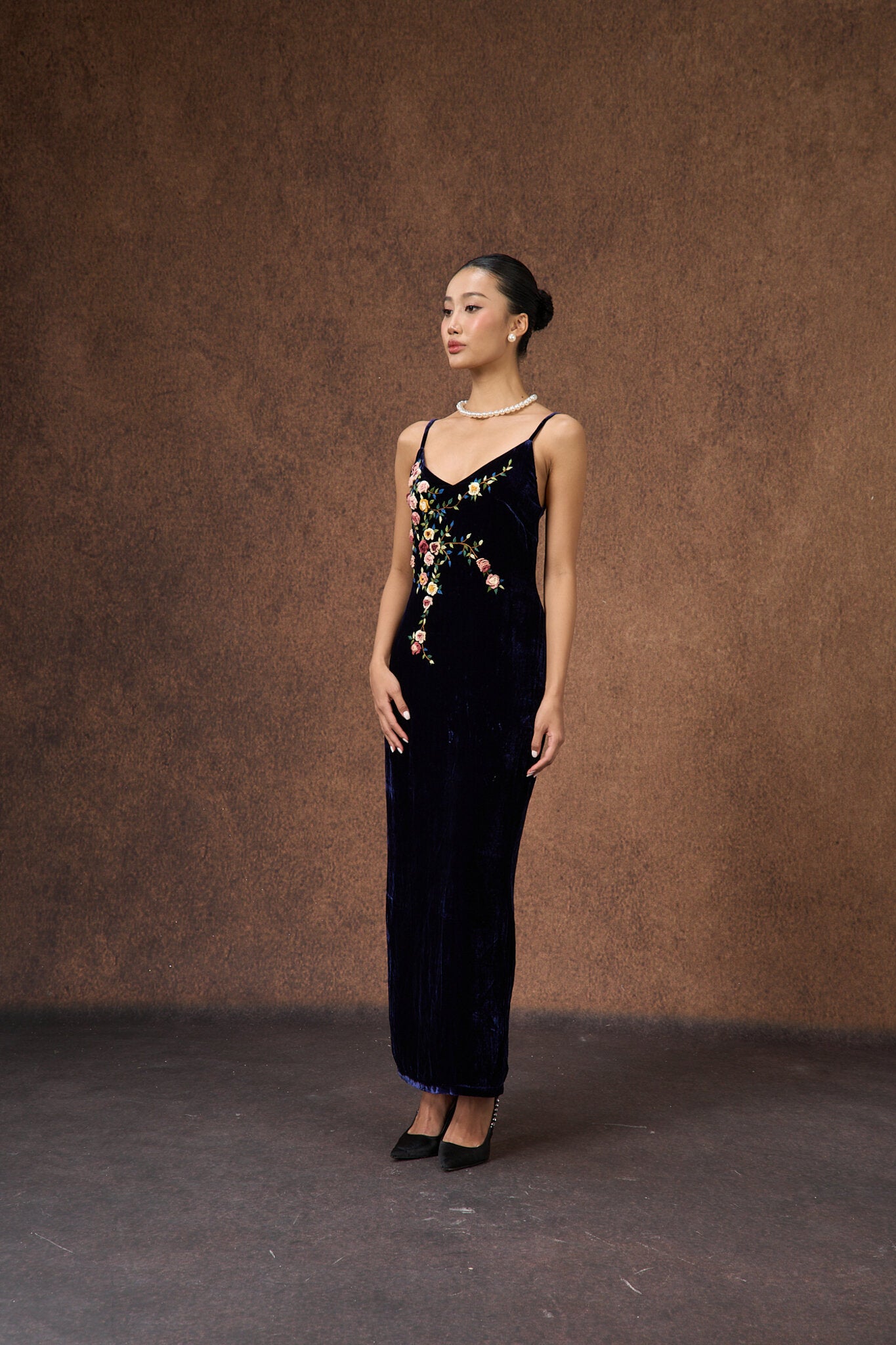 Hand-embroidered midnight navy silk velvet evening dress, three-quarter view
