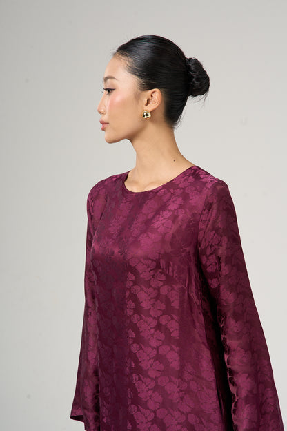 Model wearing the Celeste mulberry bloom silk jacquard maxi dress, three-quarter view