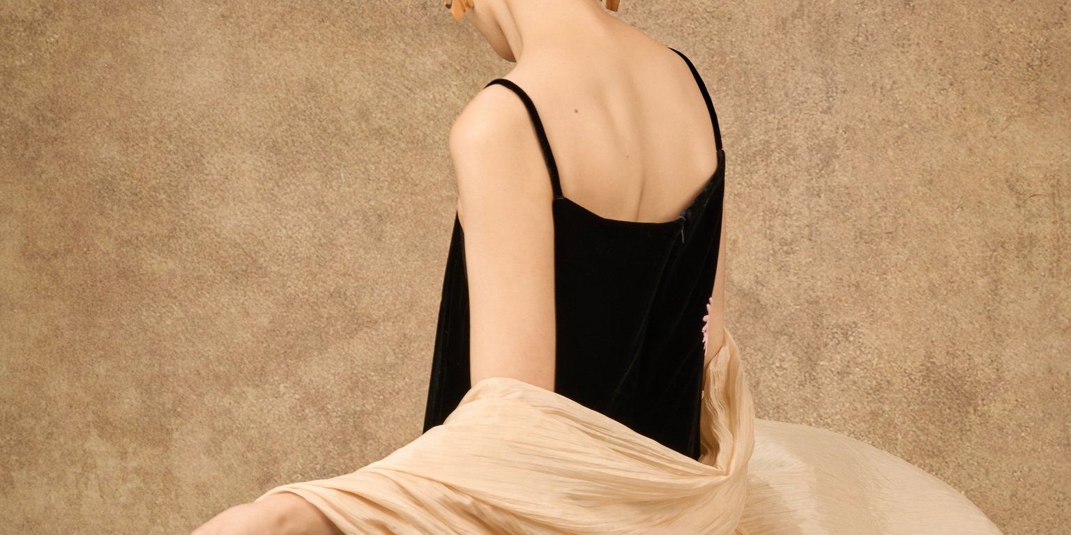 Model wearing hand-dyed champagne silk shawl over an embroidered velvet dress — Silk & Bears